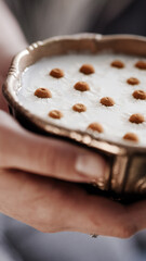 Milk with flowers in cup.
