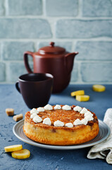 Caramel banana cake with tea in a plate