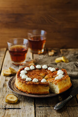 Caramel banana cake with tea in a plate