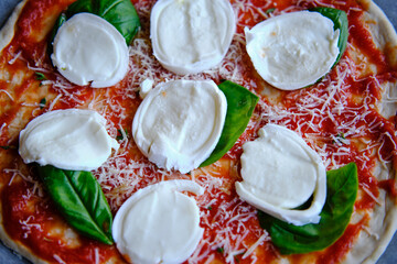 Making margherita pizza at home
