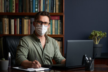 Work at home during coronavirus quarantine. Man working from home