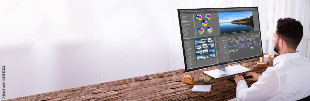 Poster Editor Editing Video On Computer