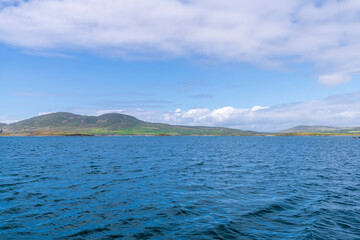 Beautiful aerial view of Beginish Island. Locations worth visiting on the Wild Atlantic Way. Scenic Irish countyside on sunny summer day, County Kerry, Ireland.