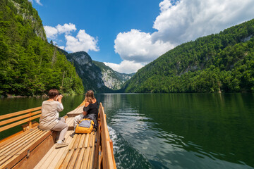 View of the prow of a "Plätte", a traditional wooden flat boat, navigating across the legendary Lake Toplitz, Ausseer Land region, Styria, Austria