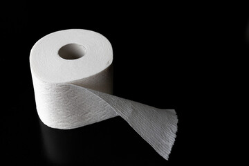 Isolated Roll of Toilet Paper on Black Background
