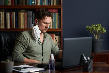 Work at home during coronavirus quarantine. Man working from home