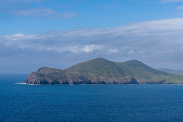 Beautiful aerial view of Beginish Island. Locations worth visiting on the Wild Atlantic Way. Scenic Irish countyside on sunny summer day, County Kerry, Ireland.
