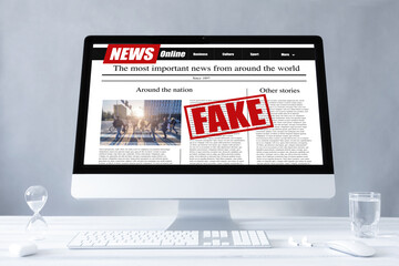 fake news on a computer screen. Mockup website. Newspaper and portal on internet. concept of disinformation and propaganda