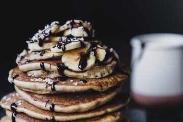 Vegan banana pancakes with chocolate syrup