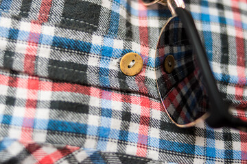 Plaid shirt with sunglasses