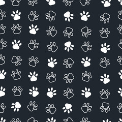 Seamless vector illustration. Modern art of dog’s paws. grey background.