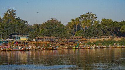 coloured wooden boats on Amarapura lake Myanmar