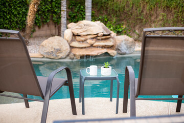 swimming pool and chairs
