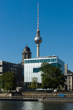 BERLIN - AUGUST 19, 2012: Embankment of Spree River, Netherlands Embassy, Kunsthaus Am Roten Rathaus by Joerg Schroeder and the Berlin TV Tower.
