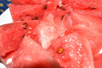 Closeup view of watermelon slice piece with seeds.