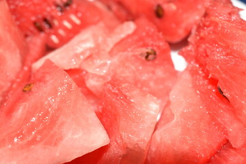 Closeup view of watermelon slice piece with seeds.