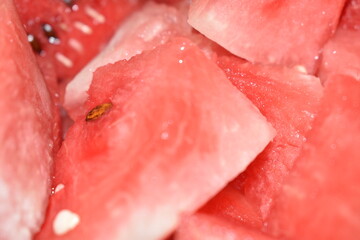 Closeup view of watermelon slice piece with seeds.