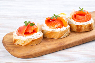 Fototapeta na wymiar Mini salmon sandwiches