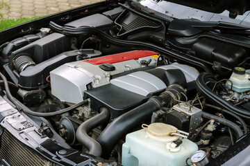 Fototapeta premium Powerful car engine with open hood