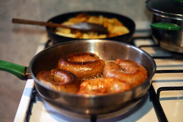 Frying sausages called 