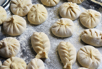 Khinkali before cooking, hand baking
