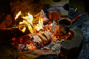 Making Turkish coffee on a campfire
