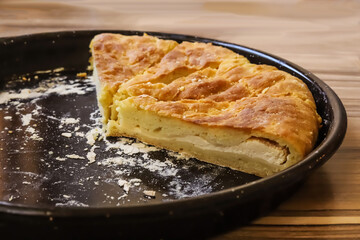 Homemade Khachapuri with cheese. In section, side view.