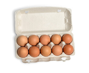 Ten brown eggs in a carton package. Top view. Ten brown eggs in a cardboard box. Eggs.