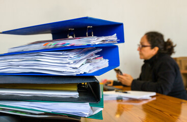 Concentrated woman working, office details