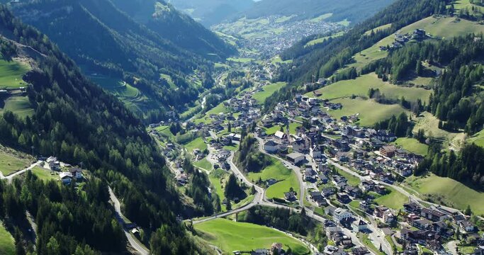 Aerial of Santa Christina in Val gardena. Beautiful Alpine town in spring 4K
