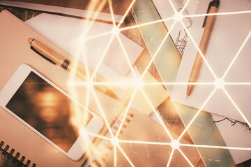 Double exposure of social network theme drawing over table with phone. Top view. People connecting...