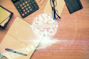 Multi exposure of crypto theme drawing and work table top veiw. Concept of blockchain technology in business.