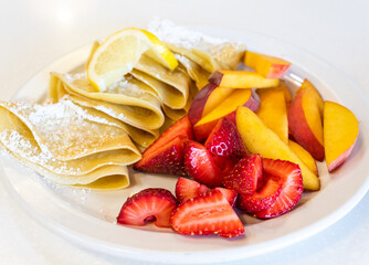 Crepes with Strawberry, Lemon, and Peach Sliced