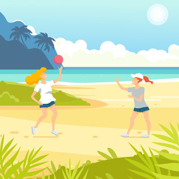 Tropical sand background. Beach overlooking the ocean. Ocean, sea. Women play volleyball.