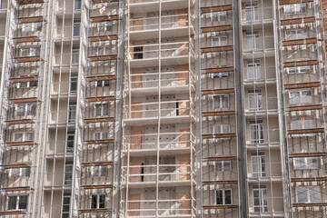 Close-up, construction of a skyscraper from metal-concrete elements