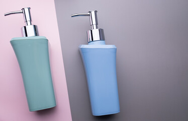 natural cosmetics bottle containers on color paper background, empty bottle ,natural beauty skincare product,  beauty product concept 
