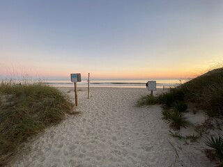 sunset on the beach sand path