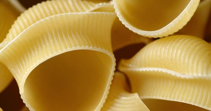 Pasta dry rigati rotates slowly.