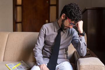 Fototapeta premium Unemployed man in his home worried.