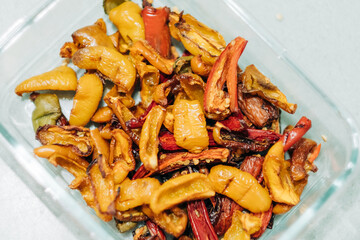 A glass bowl full on dried and smoked spicy peppers.