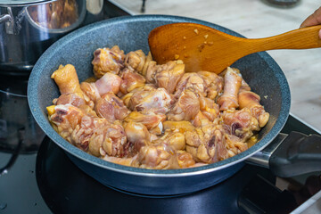 Homemade braised chicken in the cooking pan