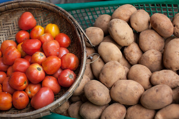 basket of potatoes and tomatoes