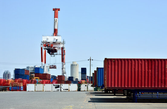 Container On Chassis Parked At The Wharf: Shipping Industry