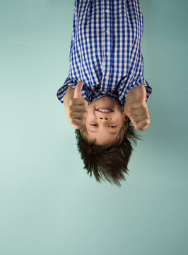 Happy Boy Hanging Upside Down