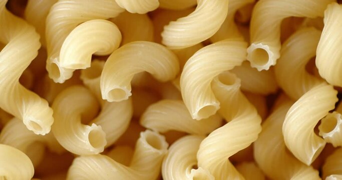 Cavatappi paste dry slowly rotates.