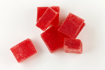 Red marmalade on white background