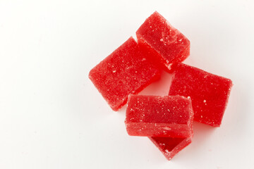 Red marmalade on white background