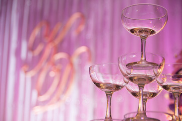 Tower of champagne in wedding ceremony