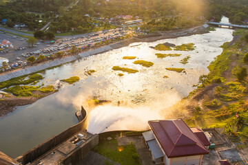 Irrigation dam released water to maintain water level in reservoir. Khun Dan dam, Nakorn Nayok, Thailand.