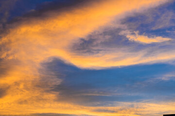 Naklejka na ściany i meble Beautiful colorful sunrise with dramatic clouds in the sky.